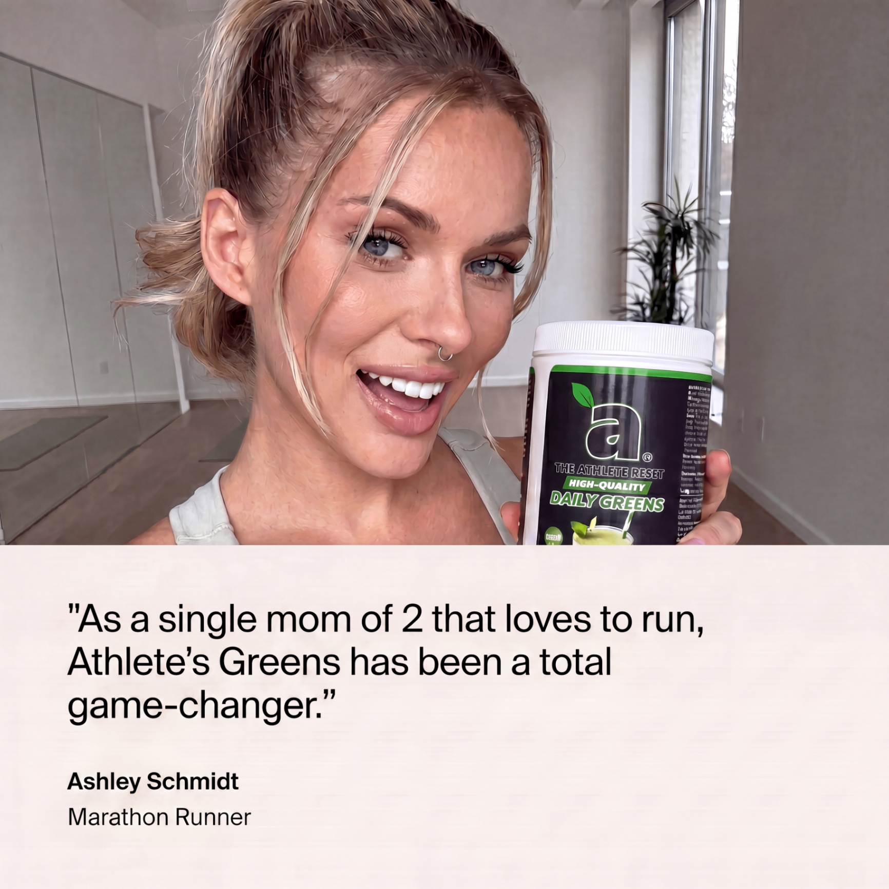 Ashley Schmidt, marathon runner, holding Athlete Reset Greens